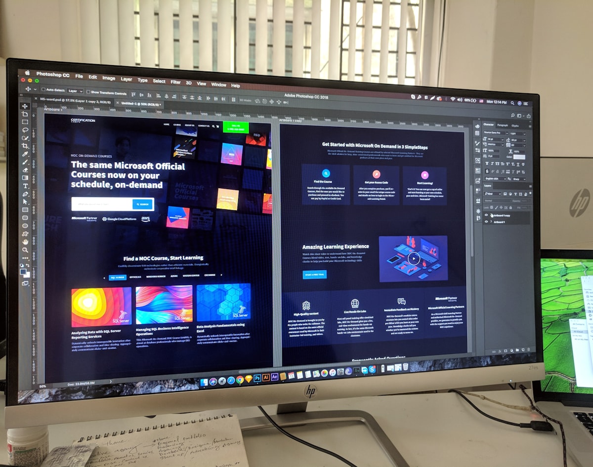 A laptop showing a design system component library on screen